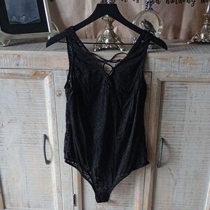 B) Torrid Black Lace Design Bodysuit